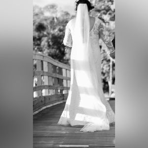 Beautiful long! Beaded wedding veil worn once!!